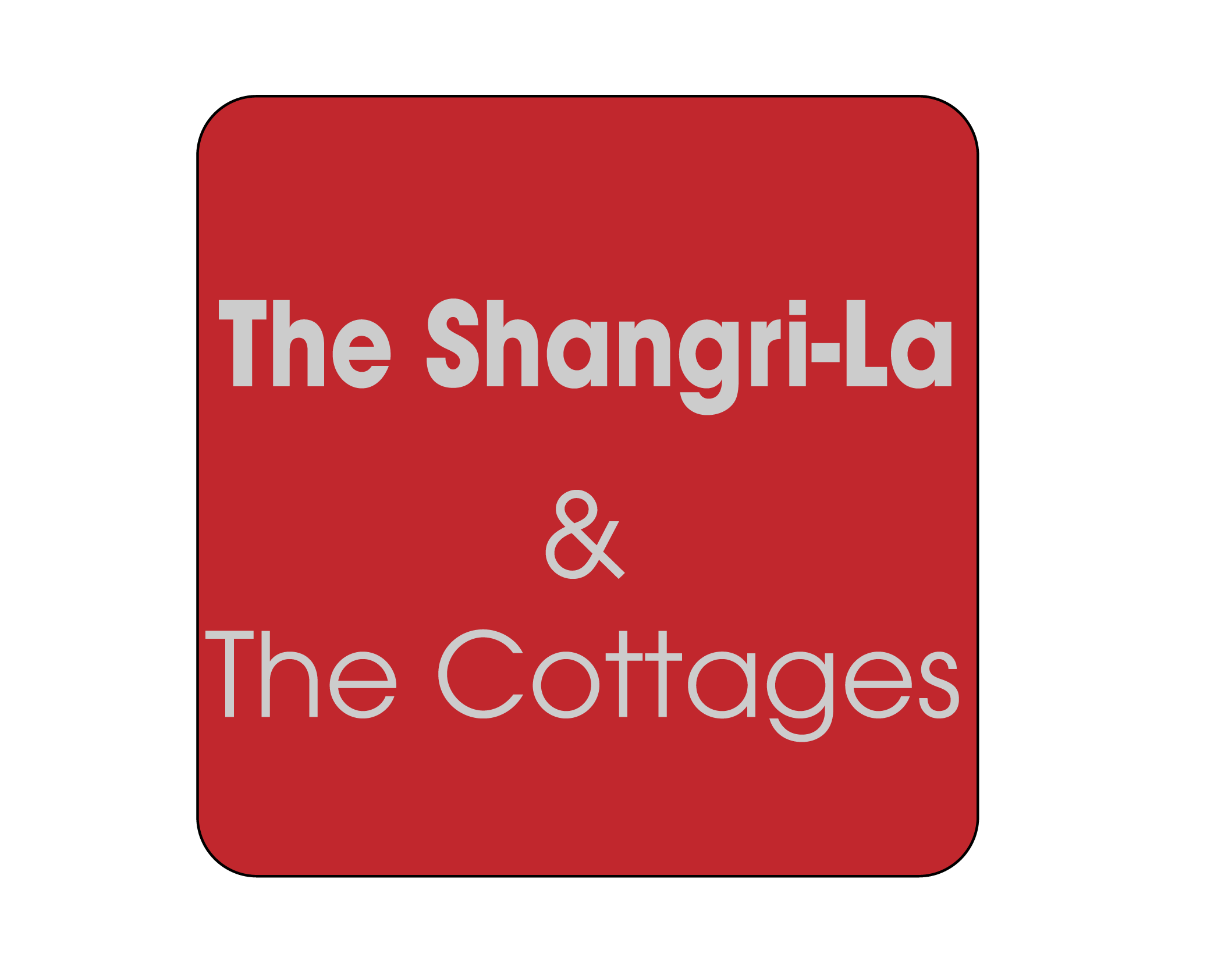 A red sign with white text that says "The Shangri-La & The Cottages".